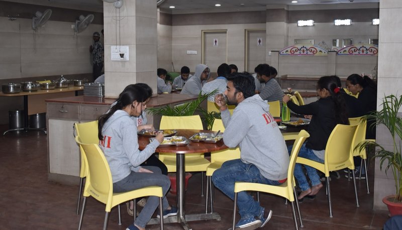 Participants eating together at the cafeteria